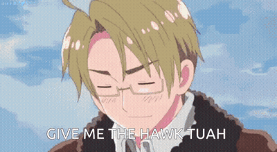 A Man With Glasses Is Smiling And Says Give Me The Hawk Tuah . GIF