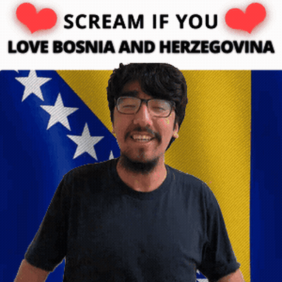 A Man With Glasses Is Smiling In Front Of A Flag With The Words Scream If You Love Bosnia And Herzegovina GIF