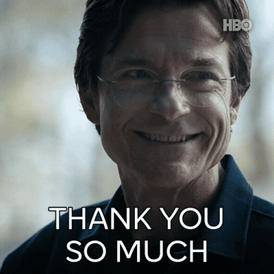 A Man With Glasses Is Smiling With The Words Thank You So Much Above Him GIF