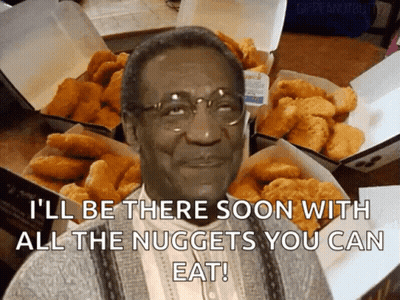 A Man With Glasses Is Surrounded By Boxes Of Nuggets And Says " I 'Ll Be There Soon GIF