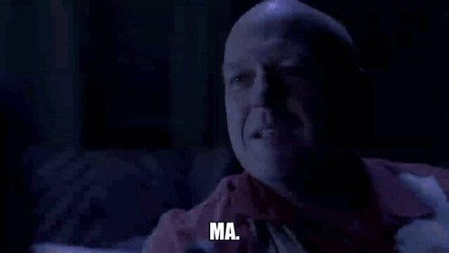 A Man With Glasses Is Talking On A Cell Phone And Says You Got Me . GIF
