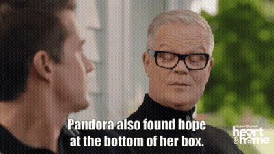 A Man With Glasses Is Talking To Another Man With The Words " Pandora Also Found Hope At The Bottom Of Her Box " GIF