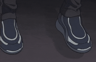A Man With Glasses Looks Out Of A Window At Night GIF