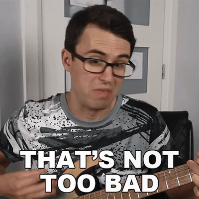 A Man With Glasses Playing A Guitar With The Words That 'S Not Too Bad Above Him GIF