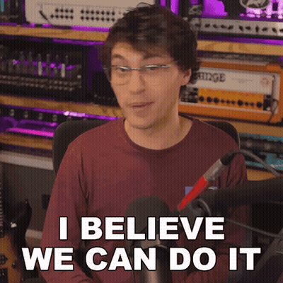 A Man With Glasses Says I Believe We Can Do It In Front Of A Microphone GIF