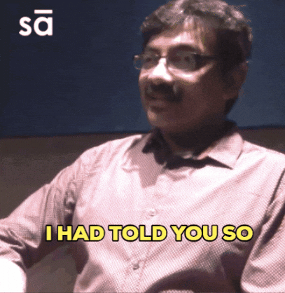 A Man With Glasses Says I Had Told You So In Yellow Letters GIF