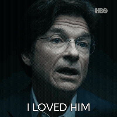 A Man With Glasses Says I Loved Him In A Dark Room GIF