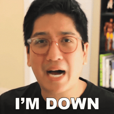 A Man With Glasses Says I 'M Down In Front Of His Face GIF