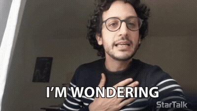 A Man With Glasses Says I 'M Wondering Startalk GIF
