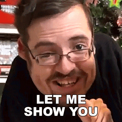 A Man With Glasses Says Let Me Show You GIF