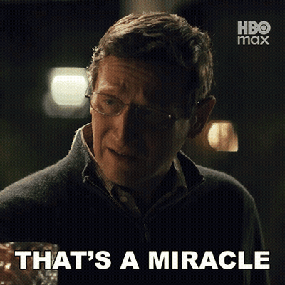 A Man With Glasses Says That 'S A Miracle With A Hbo Max Logo Behind Him GIF
