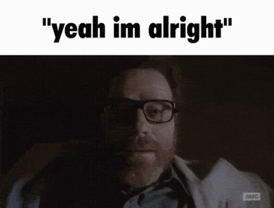 A Man With Glasses Says " Yeah Im Alright " In A Dark Room GIF