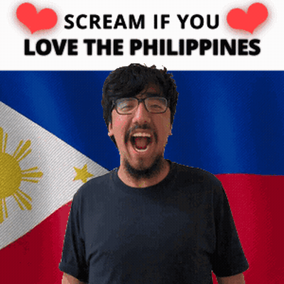 A Man With Glasses Screams In Front Of A Philippines Flag GIF