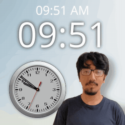 A Man With Glasses Stands In Front Of A Clock That Says 9:51 Am GIF