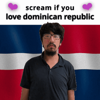 A Man With Glasses Stands In Front Of A Dominican Republic Flag And Says " Scream If You Love Dominican Republic " GIF