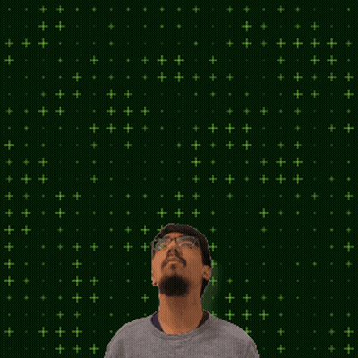 A Man With Glasses Stands In Front Of A Green Background With The Number 14 And 9 GIF