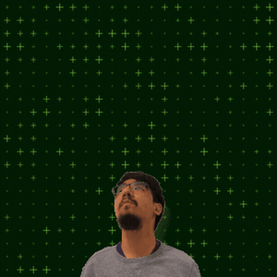 A Man With Glasses Stands In Front Of A Green Background With The Number 15 + 10 GIF