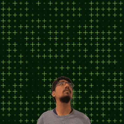 A Man With Glasses Stands In Front Of A Green Background With The Number 19 GIF