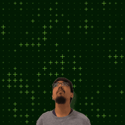 A Man With Glasses Stands In Front Of A Green Background With The Number 20 On It GIF