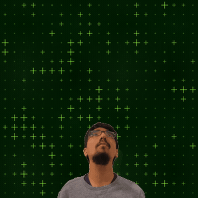A Man With Glasses Stands In Front Of A Green Background With The Number 20 GIF
