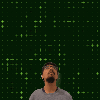 A Man With Glasses Stands In Front Of A Green Background With The Number 20 GIF