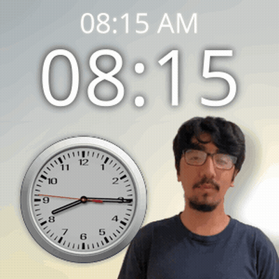 A Man With Glasses Stands In Front Of A Wall Clock That Says 08:15 Am GIF
