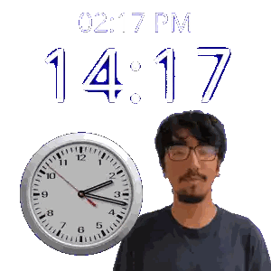 A Man With Glasses Stands Next To A Clock That Says 14:17 Sticker