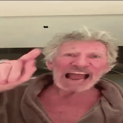 A Man With Gray Hair And A Beard Is Giving A Middle Finger GIF