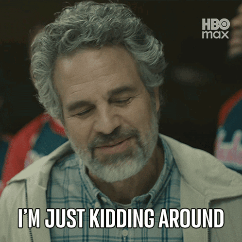A Man With Gray Hair And A Beard Is Saying I 'M Just Kidding Around GIF