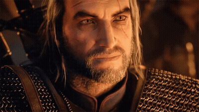 A Man With Gray Hair And A Beard Is Wearing A Chain Mail Jacket GIF