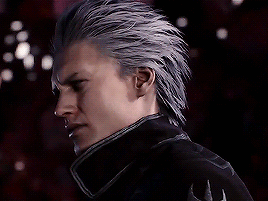 A Man With Gray Hair And A Black Jacket Is Looking At The Camera With A Serious Look On His Face . GIF