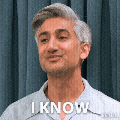 A Man With Gray Hair And A Shirt That Says I Know On It GIF