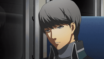A Man With Gray Hair And Blue Eyes Is Sitting On A Blue Chair GIF