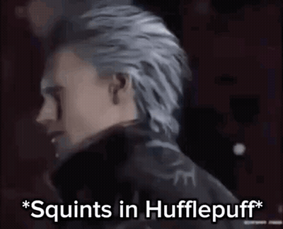 A Man With Gray Hair Is Standing In Front Of A Red Background And Says `` Squirts In Hufflepuff '' . GIF