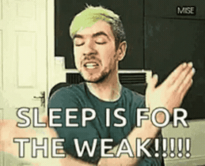 A Man With Green Hair Is Making A Funny Face And Says `` Sleep Is For The Weak !!! '' GIF