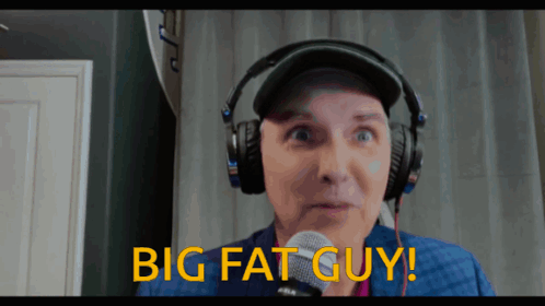 A Man With Headphones And A Microphone Says Big Fat Guy GIF