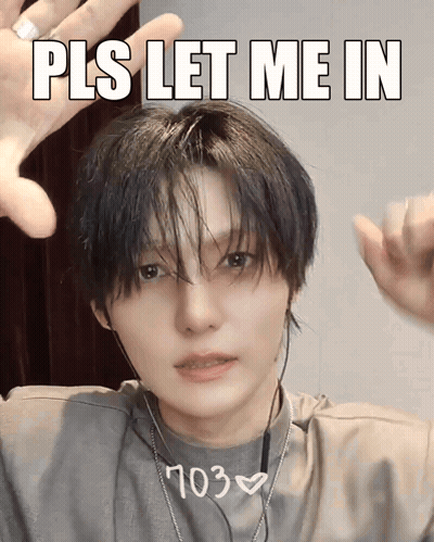 A Man With Headphones And A Shirt That Says ' 703 ' On It GIF
