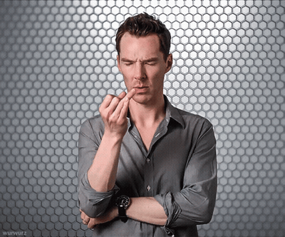 A Man With His Arms Crossed And A Watch On His Wrist GIF