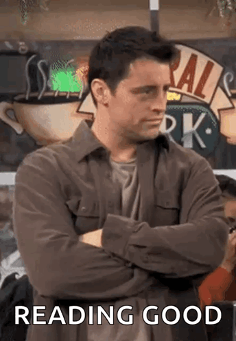 Man Standing With Reading Good Sign GIF