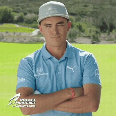 A Man With His Arms Crossed Is Wearing A Shirt That Says Rocket Mortgage GIF