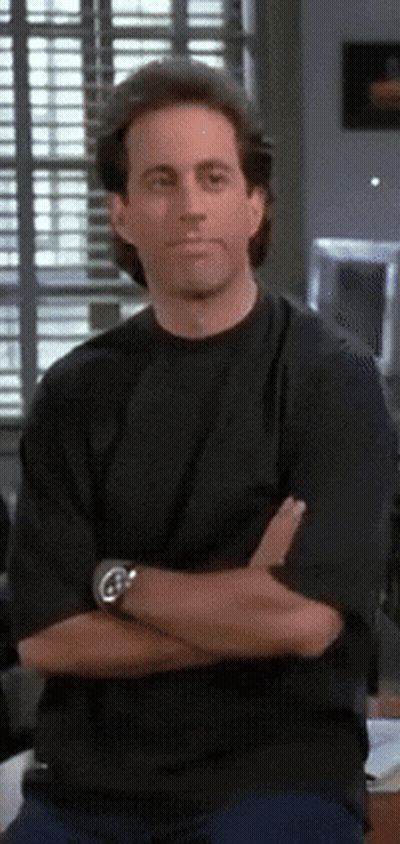 A Man With His Arms Crossed Is Wearing A Watch On His Wrist GIF