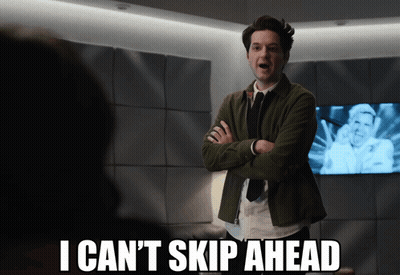 A Man With His Arms Crossed Says " I Can 'T Skip Ahead " In Front Of A Tv GIF