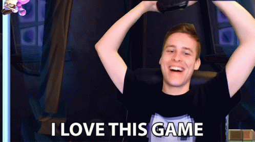 A Man With His Arms In The Air And The Words I Love This Game On The Bottom GIF