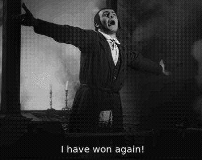 A Man With His Arms Outstretched And The Words I Have Won Again GIF