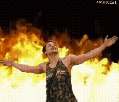 A Man With His Arms Outstretched Is Wearing A Tank Top That Says Strong On It GIF