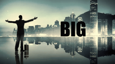A Man With His Arms Outstretched Stands In Front Of A City With The Word Big On It GIF
