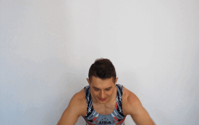 A Man With His Arms Outstretched Wearing A Usa Tank Top GIF