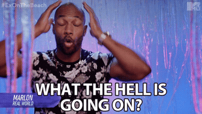 A Man With His Eyes Closed And His Hands On His Head Says What The Hell Is Going On GIF