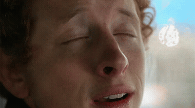 A Man With His Eyes Closed And His Mouth Open GIF