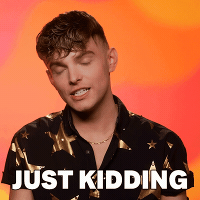 A Man With His Eyes Closed And The Words Just Kidding Written Below Him GIF